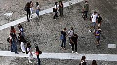 Students enter the Visconti high school, in Rome, Monday, Sept. 14, 2020.