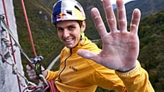 Domen Skofic resting at a belay on the Trbovlje Chimney in Trbovlje, Slovenia