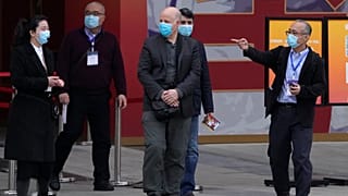 Covid-19'un kökenini araştırmak için Çin'e gelen DSÖ uzman heyeti