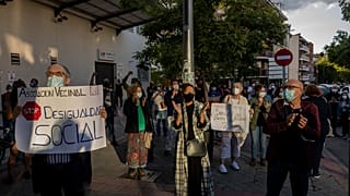 Protesters demand more resources for public health system and against social inequality in the southern neighbourhood of Vallecas, Madrid, Spain, Thursday, Sept. 24, 2020.