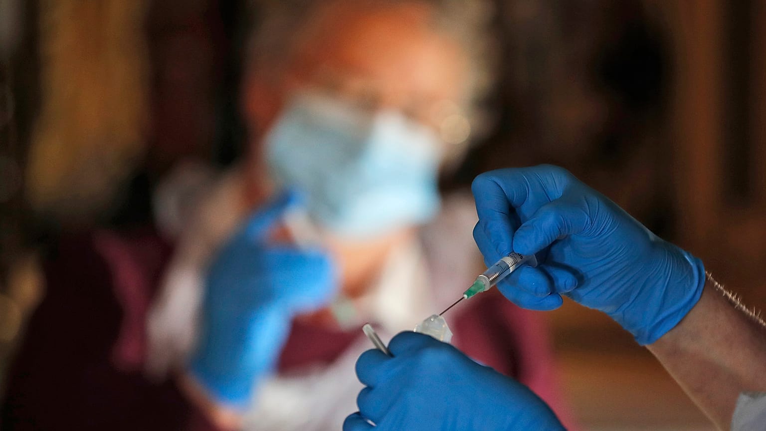 Health workers prepare for COVID-19 vaccination  inside Salisbury Cathedral in Salisbury, England, Jan. 20, 2021. 