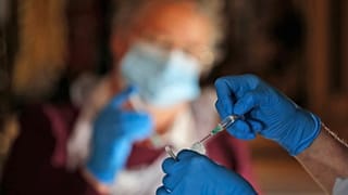 Health workers prepare for COVID-19 vaccination  inside Salisbury Cathedral in Salisbury, England, Jan. 20, 2021. 