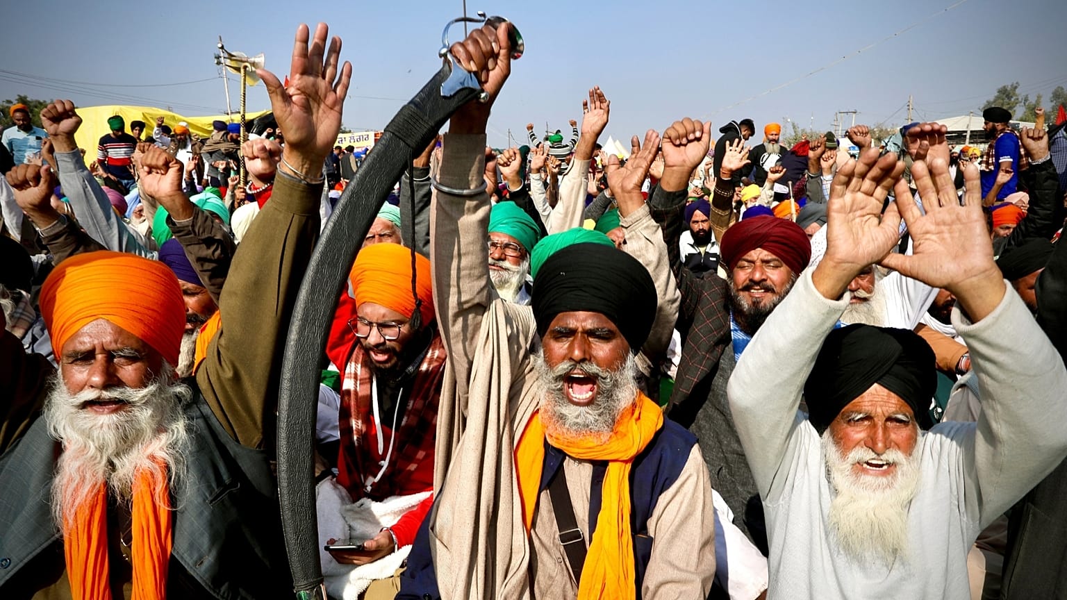 Indian farmers take to the streets to protest against controversial new agricultural laws