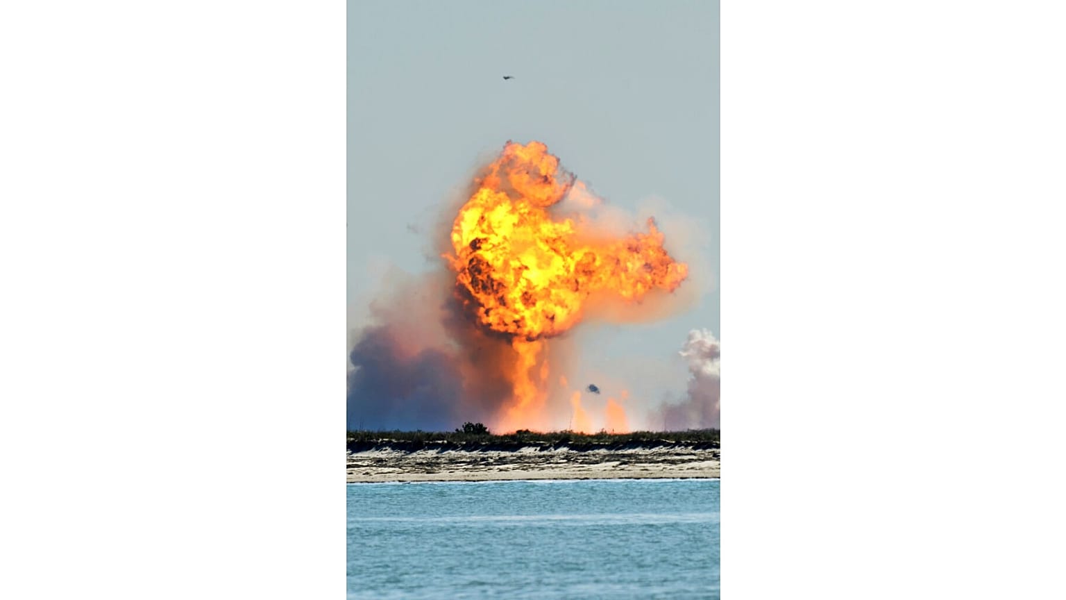 SpaceX's bullet-shaped Starship prototype explodes after crashing while attempting to land following a successful test launch, Tuesday, Feb. 2, 2021, in Boca Chica, Texas.