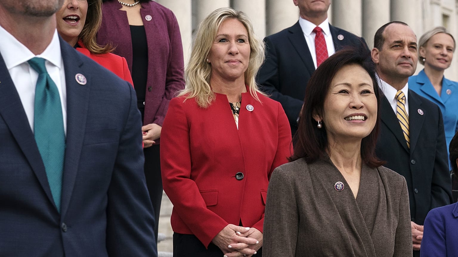 Rep. Marjorie Taylor Greene, R-Ga., centre, stands with other GOP freshmen during an event at the Capitol in Washington.