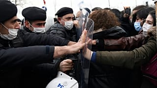 Turkish police officers clash with students of the Bogazici University protesting the appointment of a government loyalist to head their university, in Istanbul.
