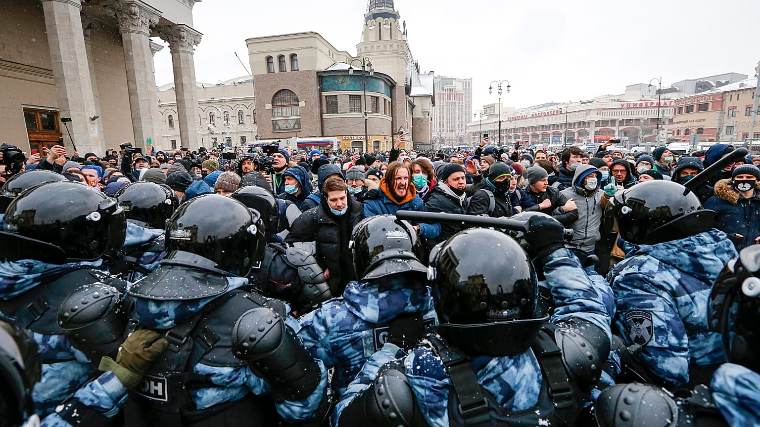 People clash with police during a protest against the jailing of opposition leader Alexei Navalny in Moscow, Russia.