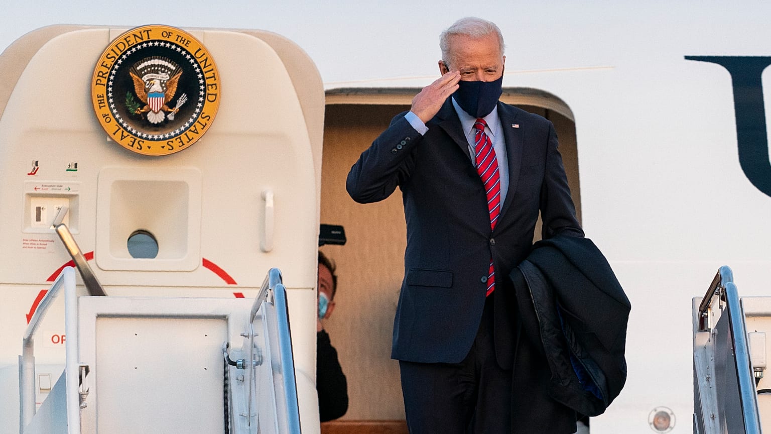 President Joe Biden boards Air Force One at Andrews Air Force Base, Md., for a weekend trip to Wilmington, De., Friday, Jan. 5, 2021. 