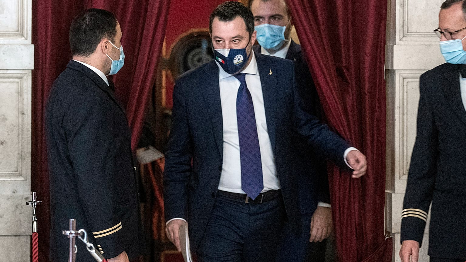 The League's Matteo Salvini, centre, arrives to address the media after meeting with Mario Draghi, at the Chamber of Deputies in Rome, Saturday, Feb. 6, 2021.