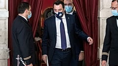 The League's Matteo Salvini, centre, arrives to address the media after meeting with Mario Draghi, at the Chamber of Deputies in Rome, Saturday, Feb. 6, 2021.