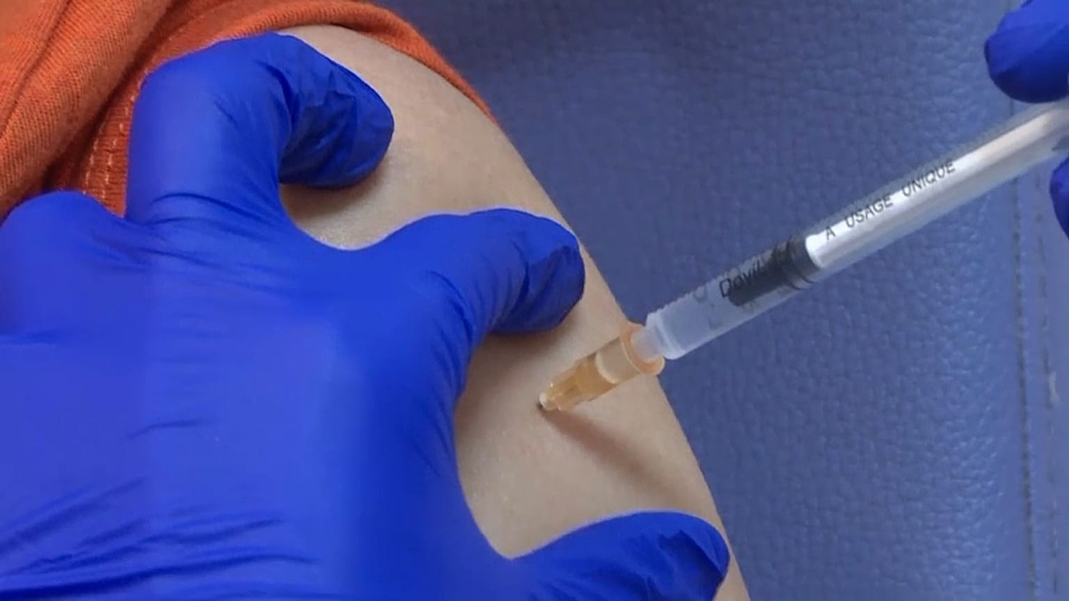 Medical worker being vaccinated in Lyon, France