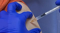 Medical worker being vaccinated in Lyon, France
