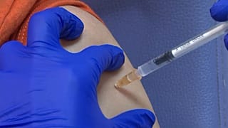 Medical worker being vaccinated in Lyon, France