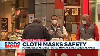 Workers wear FFP2 face masks