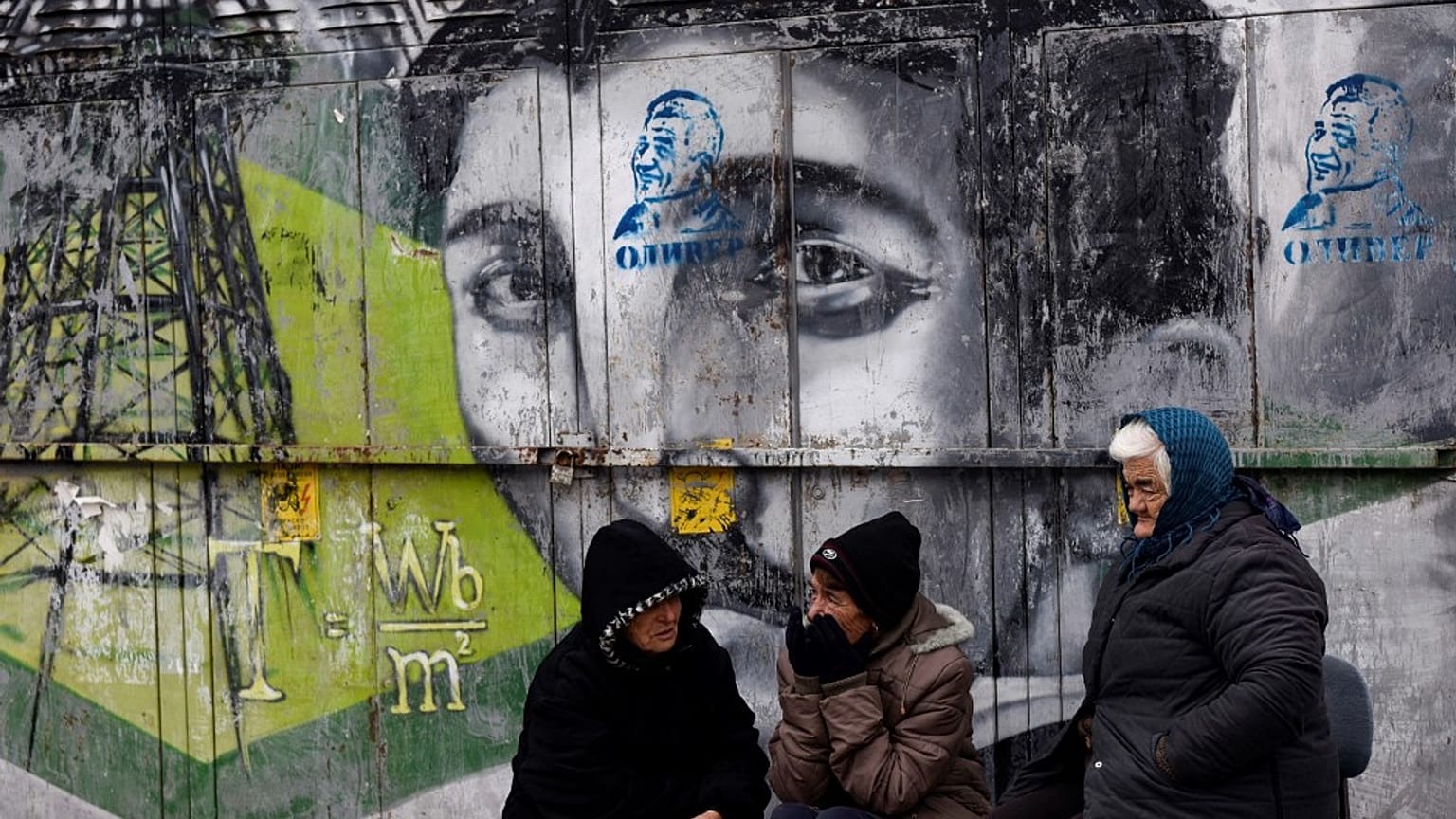 Kosovo Serbs street vendors wait for customers in the town of Gracanica near Pristina, on December 29, 2018.