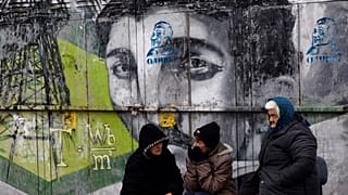 Kosovo Serbs street vendors wait for customers in the town of Gracanica near Pristina, on December 29, 2018.