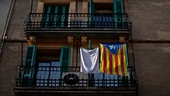 An "estelada" or independence flag hangs on a balcony in downtown Barcelona, Spain, Thursday, Jan. 28, 2021. 
