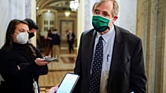 Sen. Jeff Merkley, D-Ore.,, leaves at the end of the day of second impeachment trial of former President Donald Trump