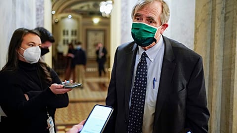 Sen. Jeff Merkley, D-Ore.,, leaves at the end of the day of second impeachment trial of former President Donald Trump