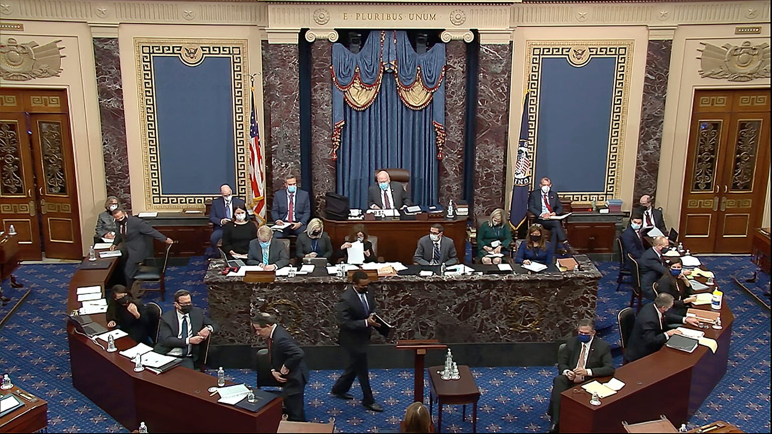  House impeachment manager Rep. Joe Neguse, D-Colo., prepares to speak during the second impeachment trial of former President Donald Trump in the Senate at the U.S. Capitol.