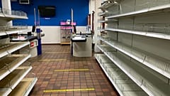 Empty shelves at Stonemanor, a British supermarket in Belgium