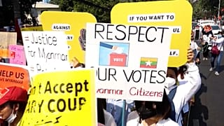 Protesters march across Yangon against the coup