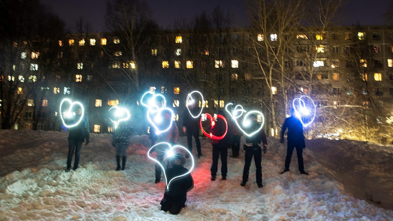 People draw hearts with their cellphones flashlights in support of jailed opposition leader Alexei Navalny and his wife Yulia Navalnaya Moscow, Russia, Sunday, Feb. 14, 2021. 