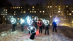 People draw hearts with their cellphones flashlights in support of jailed opposition leader Alexei Navalny and his wife Yulia Navalnaya Moscow, Russia, Sunday, Feb. 14, 2021. 