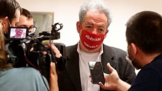 Andras Arato, Klubradio's director and CEO talks to the press after the court verdict in Budapest, Tuesday, Feb. 9, 2021.
