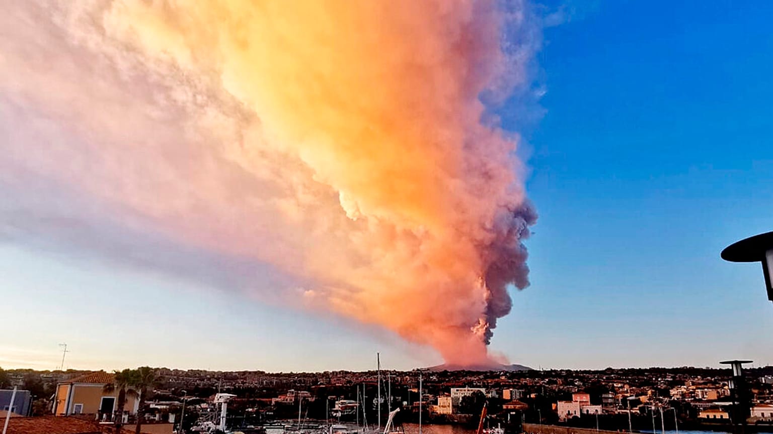 Smoke rises from exploding Mount Etna