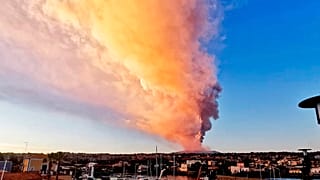 Smoke rises from exploding Mount Etna