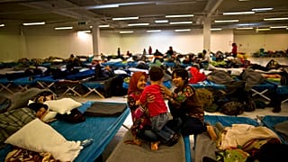 FILE: Afghan refugee children at a distribution centre, Freilassing, Germany, Dec. 8, 2015