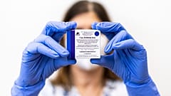 A health worker shows a box of the Russian vaccine Sputnik V at Szent Janos Hospital in Budapest, Hungary.
