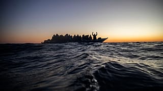 A crowded boat of migrants was intercepted 122 miles off the Libyan coast on February 12, 2021 