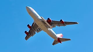 A Boeing 747-400 cargo plane in flight over the Mojave Desert, north of Los Angeles.