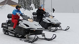 Putin und Lukaschenko auf Motorschlitten