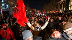 Supporters of the left-wing Self-Determination Movement party react in Pristina, the capitol of Kosovo, on Sunday, Feb. 14, 2021. 