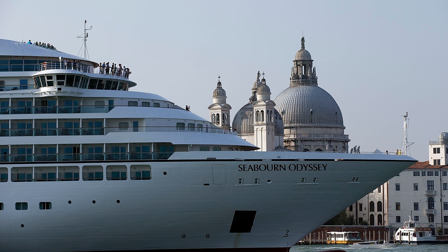 A cruise ship manoeuvres through the Giudecca canal in front of St. Mark's Square, in Venice, Italy. 