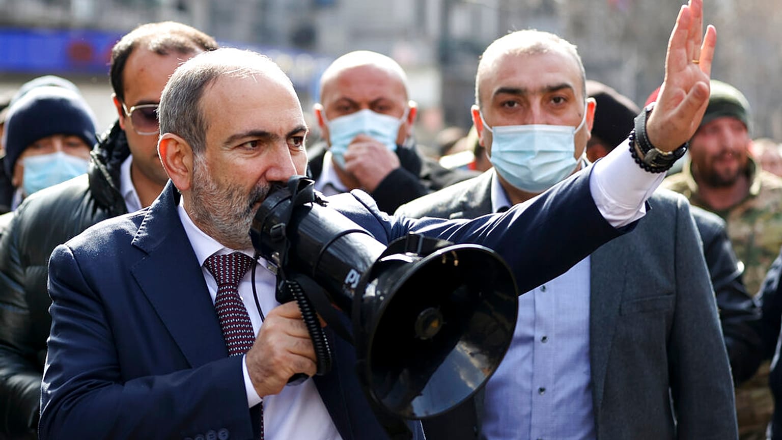 Armenian Prime Minister Nikol Pashinyan speaks through a loudspeaker during a rally in the central in Yerevan, Armenia,