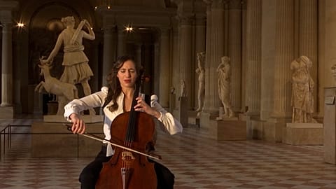 Cellist Camille Thomas fills empty Louvre with classical music