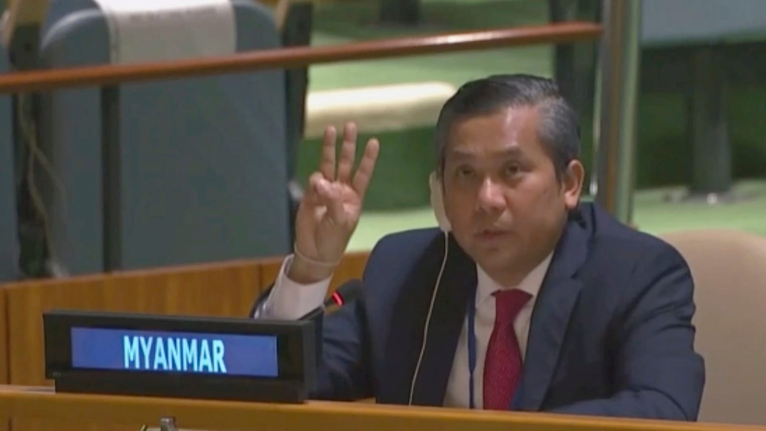 Myanmar Ambassador to the United Nations Kyaw Moe Tun flashes the three-fingered salute at the U.N. General Assembly at the United Nations Friday, Feb. 27, 2021. 