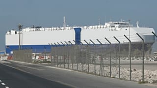 The Israeli-owned cargo ship, Helios Ray, sits docked in port after arriving earlier in Dubai, United Arab Emirates, Sunday, Feb. 28, 2021.