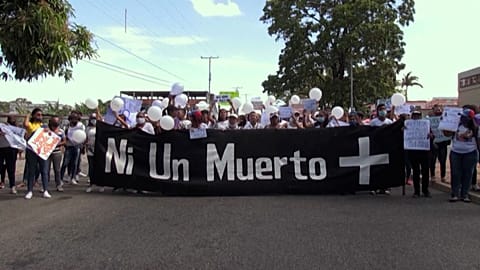 Hundreds take to streets in Venezuela over murders of three women