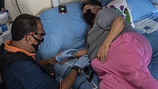 Archives : une personne en surpoids infectée par le Covid-19 à  Ciudad Nezahualcoyotl (Mexique), le 15/06/2020