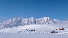 Rescue workers pictured at the site of the accident, in the snowy mountains near the Turkish eastern city of Bitlis.