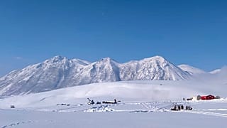 Rescue workers pictured at the site of the accident, in the snowy mountains near the Turkish eastern city of Bitlis.