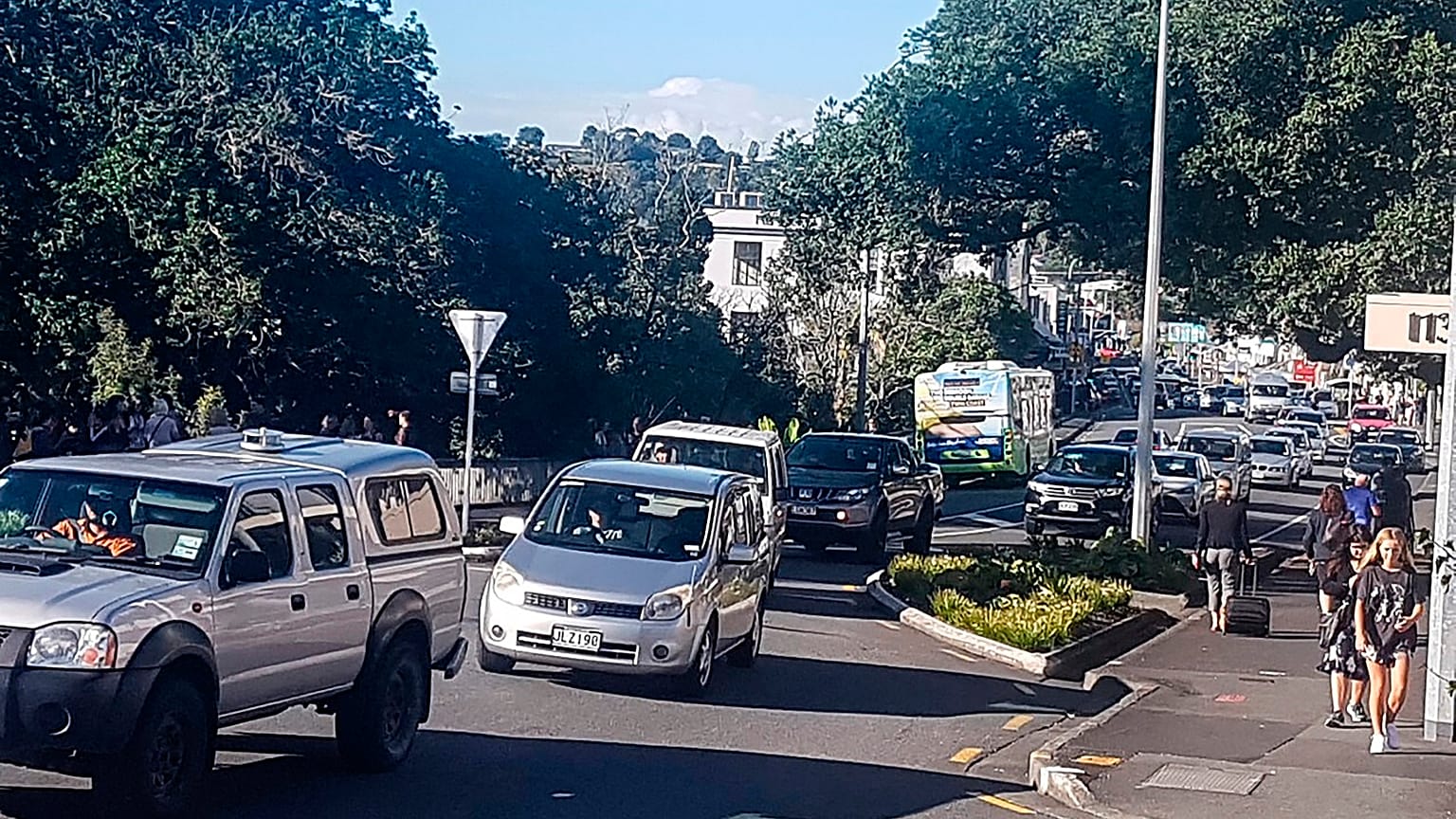 Traffic slowly works up to high ground at Whangarei, New Zealand, as a tsunami warning is issued Friday, March 5, 2021. 