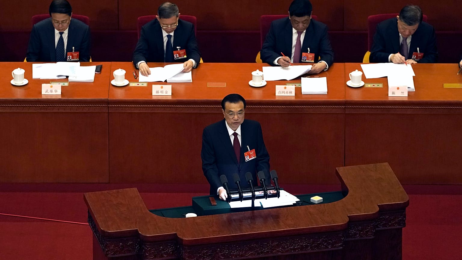Chinese Premier Li Keqiang delivers a speech during China's National People's Congress (NPC) at the Great Hall of the People in Beijing, Friday, March 5, 2021. 