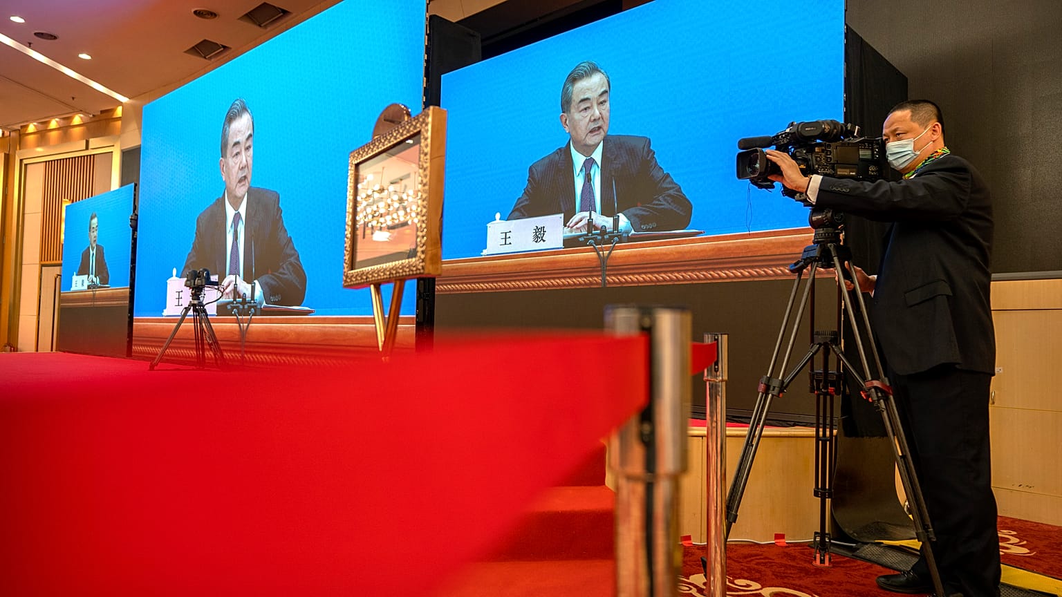 Chinese Foreign Minister Wang Yi during a remote video press conference on the sidelines of the annual meeting of the National People's Congress in Beijin, March 7, 2021.