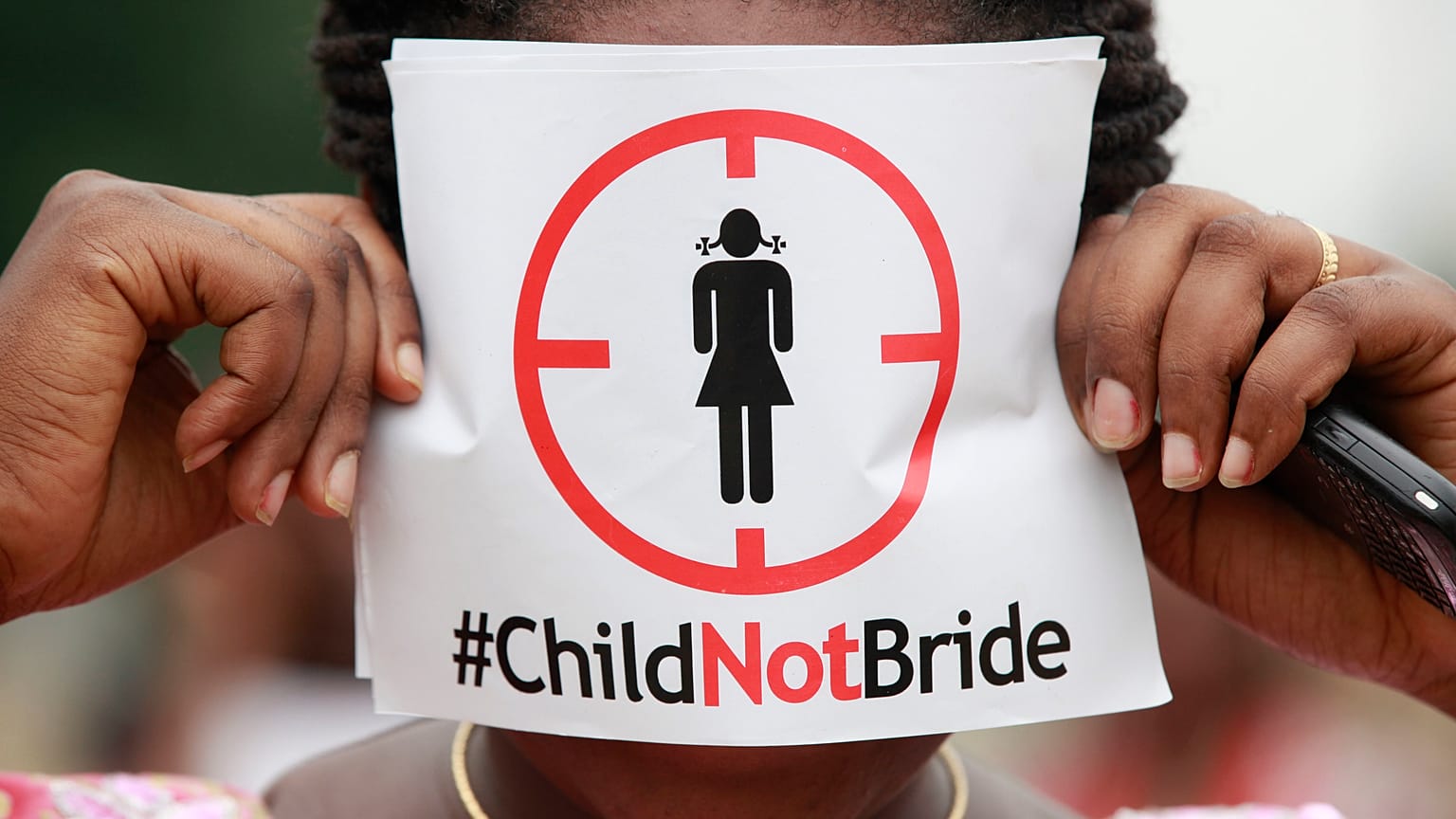 A woman protests against underage marriage in Lagos, Nigeria on July 20, 2013.